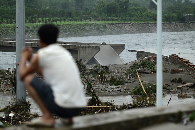 Số người chết tăng lên ở Bắc Kinh, tỉnh phụ cận do siêu bão Doksuri - Ảnh 1.