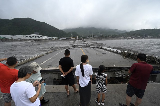 Số người chết tăng lên ở Bắc Kinh, tỉnh phụ cận do siêu bão Doksuri - Ảnh 6.