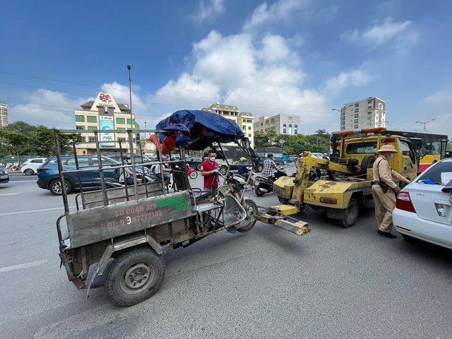 Hà Nội: Nhiều người bị phạt nguội từ ‘camera chạy bằng cơm’ - Ảnh 2.