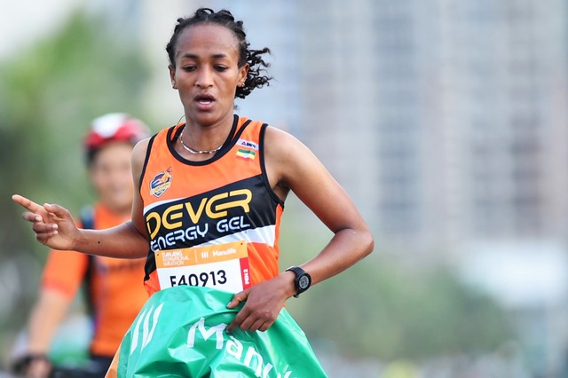 Vận động viên người người Ethiopia phá kỷ lục 42km tại giải Marathon Đà Nẵng   - Ảnh 1.