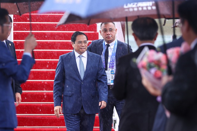 Thủ tướng Phạm Minh Chính đã tới Trung Quốc dự khai mạc CAEXPO - CABIS 20 - Ảnh 2.