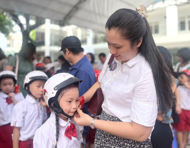 Honda Việt Nam tặng 2 triệu mũ bảo hiểm cho học sinh lớp 1 trên toàn quốc - Ảnh 3.