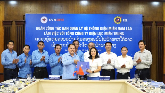 TCT Điện lực miền Trung ký thỏa thuận với BQL hệ thống điện miền Nam Lào - Ảnh 1.