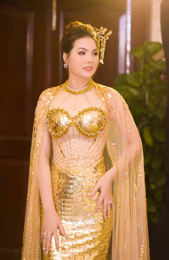 CEO áo dài Ngọc Trang: Tôi muốn góp phần gìn giữ tà áo dài Việt Nam- Ảnh 1.