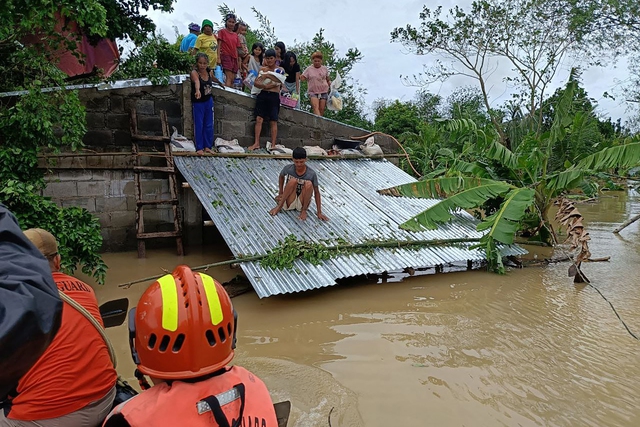 Philippines hứng chịu lũ lụt nghiêm trọng do bão Trà Mi- Ảnh 1.