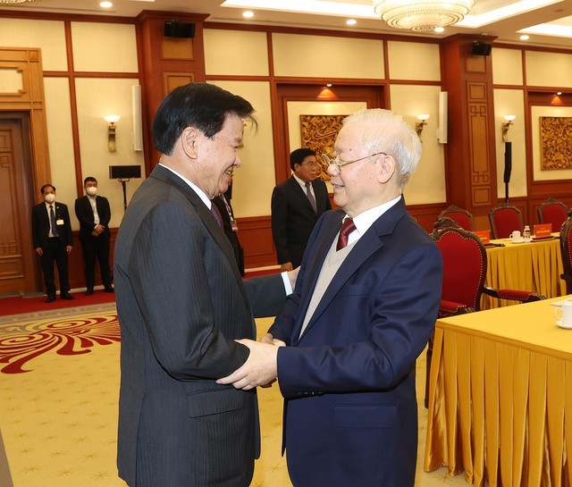 Tổng Bí thư Việt Nam, Lào chủ trì cuộc gặp cấp cao giữa hai đảng- Ảnh 1.
