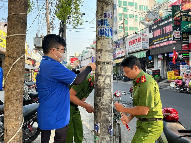 Nỗ lực bài trừ hành vi dán trái phép tờ rơi quảng cáo- Ảnh 5.