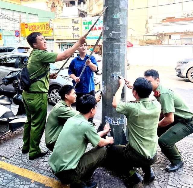 Nỗ lực bài trừ hành vi dán trái phép tờ rơi quảng cáo- Ảnh 4.