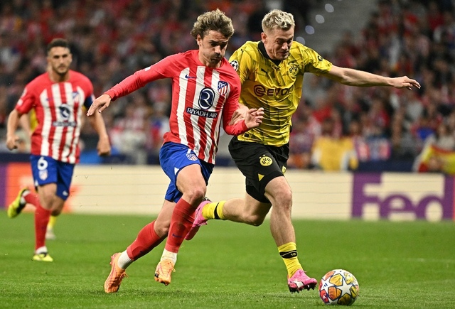 Trận Atletico Madrid (trái) thắng Borussia Dortmund tỷ số 2-1 ngày 11.4