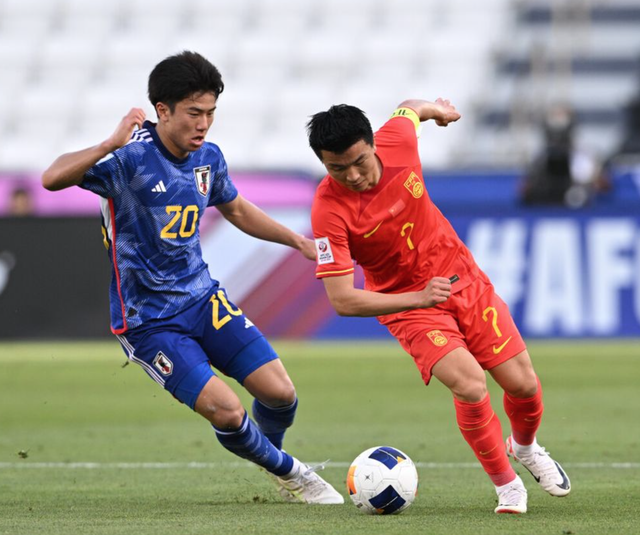 Lợi thế hơn người không giúp U.23 Trung Quốc thoát thua U.23 Nhật Bản- Ảnh 1.