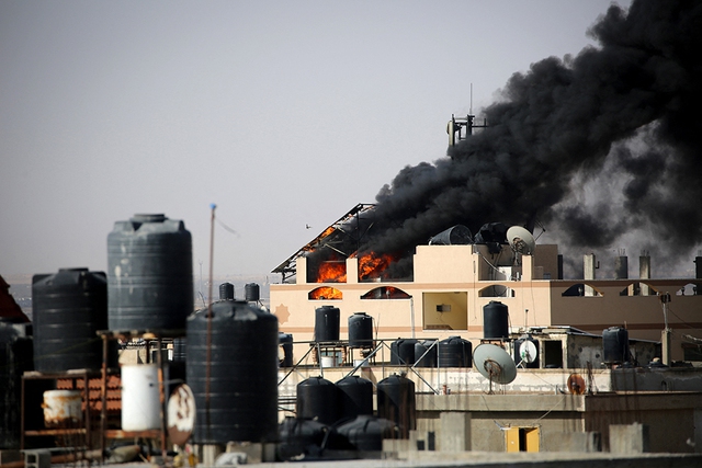 Một vụ cháy tại Rafah do Israel oanh tạc ngày 10.5