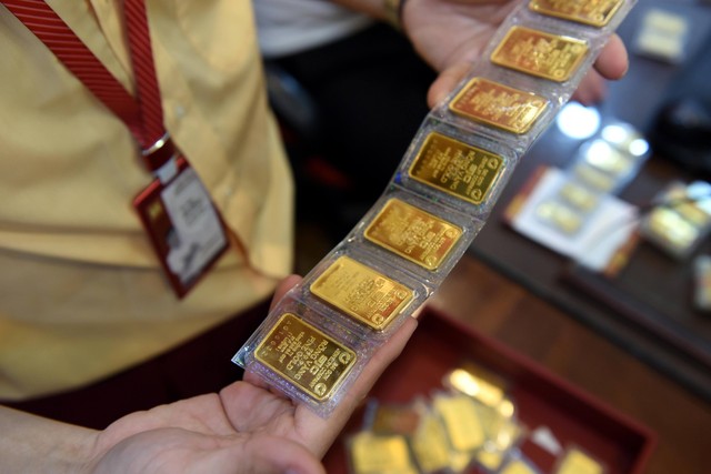 11 thành viên trúng thầu 13.400 lượng vàng với giá 88,72 - 88,73 triệu đồng/lượng- Ảnh 1.