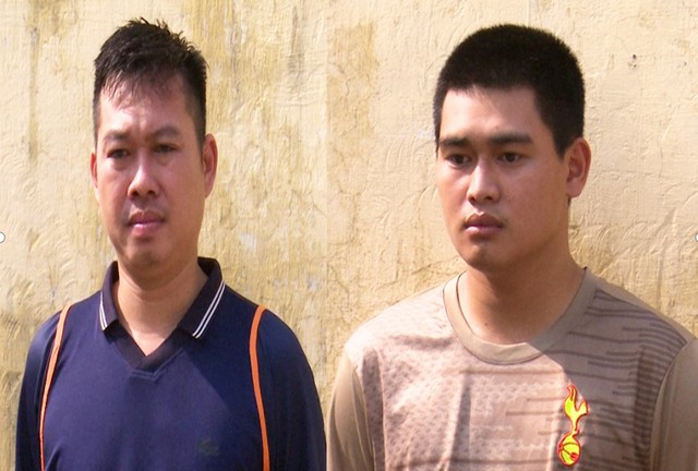 Hai bị can Mai Thanh Tèo ( bên trái ) và Lâm Thanh Phúc tại cơ quan công an