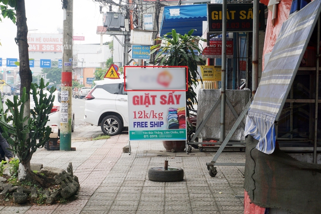 Logo trang mạng cờ bạc quảng cáo trên biển hiệu cơ sở kinh doanh đường Tôn Đức Thắng (P.Hòa Minh, Q.Liên Chiểu)