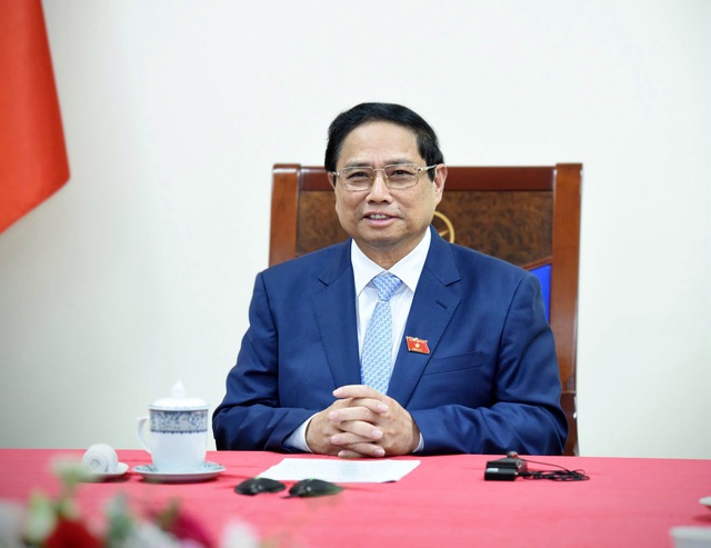 Thủ tướng Phạm Minh Chính mời tân Thủ tướng Singapore Lawrence Wong sớm thăm Việt Nam- Ảnh 1.