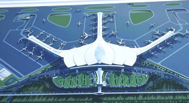 Phối cảnh nhà ga hành khách sân bay Long Thành khi hoàn thành. Nhà ga được thiết kế theo hình ảnh hoa sen, gồm 1 tầng trệt và 3 tầng lầu, tổng diện tích sàn 376.451,32 mét vuông; chiều cao đỉnh mái 45,55 m; bố trí 40 vị trí đỗ gần cho các máy bay