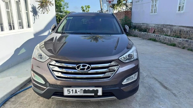 Hyundai Santa Fe 2014 giá hơn 400 triệu đồng sau 10 năm sử dụng- Ảnh 1.