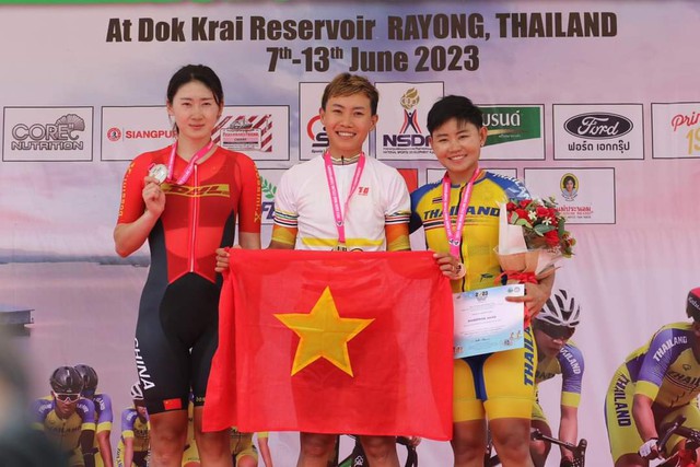 Cua rơ Nguyễn Thị Thật thay thế cung thủ Ánh Nguyệt cầm cờ Việt Nam khai mạc Olympic- Ảnh 1.