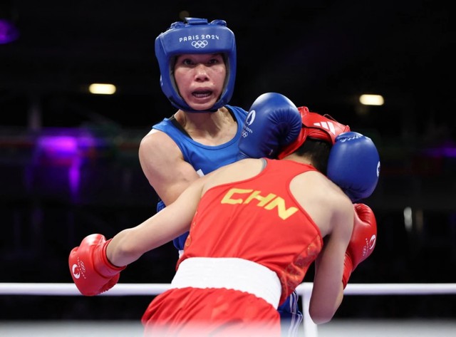 Olympic Paris: 'Bà mẹ hai con' Hà Thị Linh lực bất tòng tâm, vẫn thua Yang Wenlu - Ảnh 2.