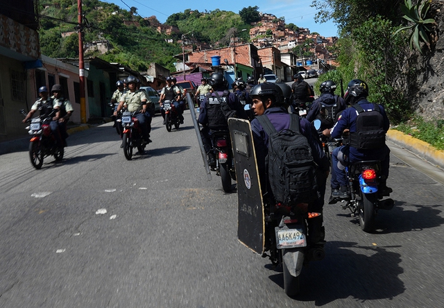 Venezuela tăng cường an ninh đối phó biểu tình sau bầu cử- Ảnh 1.