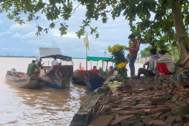 Tìm thấy thi thể bé trai 12 tuổi đuối nước trên sông Cổ Chiên- Ảnh 2.