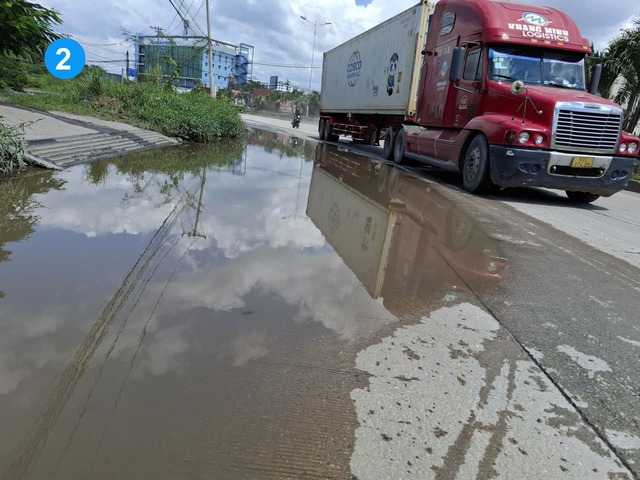 Đường ngập nước, nguy cơ xảy ra tai nạn - Ảnh 2.