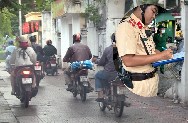 Xe máy ùn ùn đi trên vỉa hè đường Cách …
