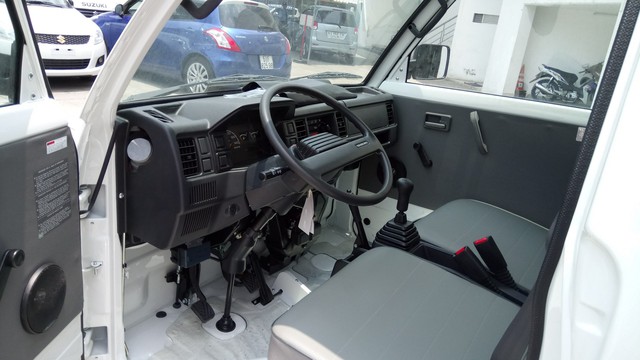 Xe tải thiết kế 1 hàng ghế, chở trẻ em dưới 10 tuổi có bị phạt? - Ảnh 1.