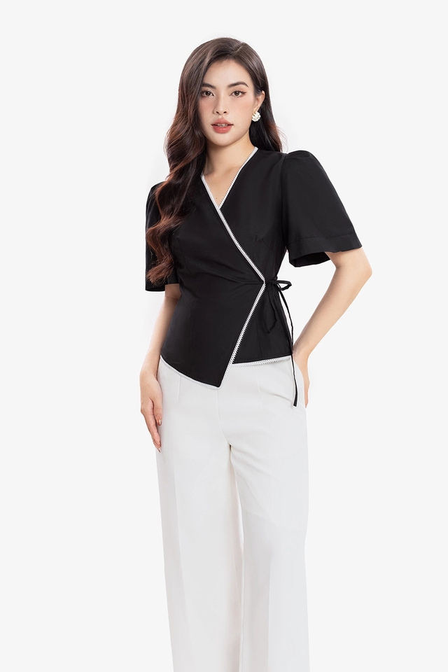 Trang phục cổ chữ V "cân" trọn mọi phong cách từ công sở đến dạo phố Trang phục cổ chữ V ‘cân’ trọn mọi phong cách từ công sở đến dạo phố- Ảnh 4.