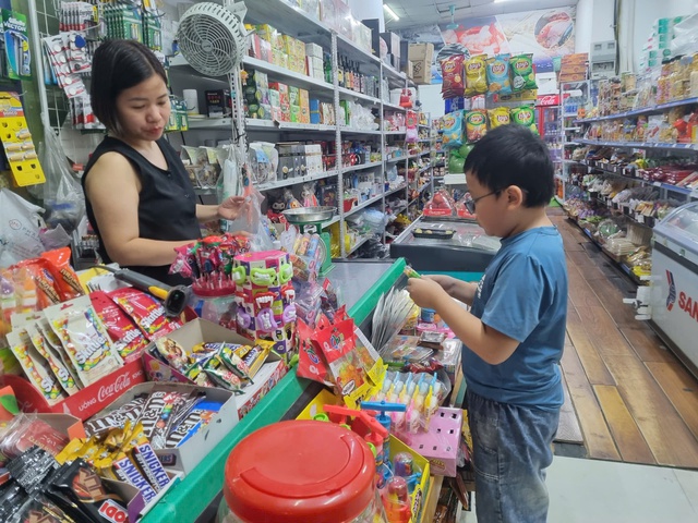 Cục Thuế nói về nâng ngưỡng doanh thu miễn thuế với hộ kinh doanh - Ảnh 1.