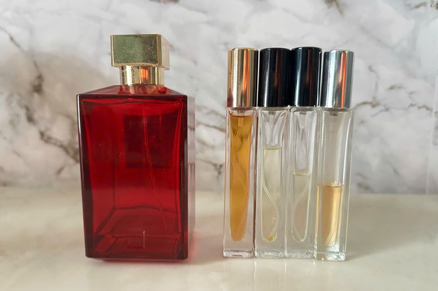 Nước hoa chai to chiết ra b&aacute;n lẻ, c&oacute; vi phạm ph&aacute;p luật?- Ảnh 2.