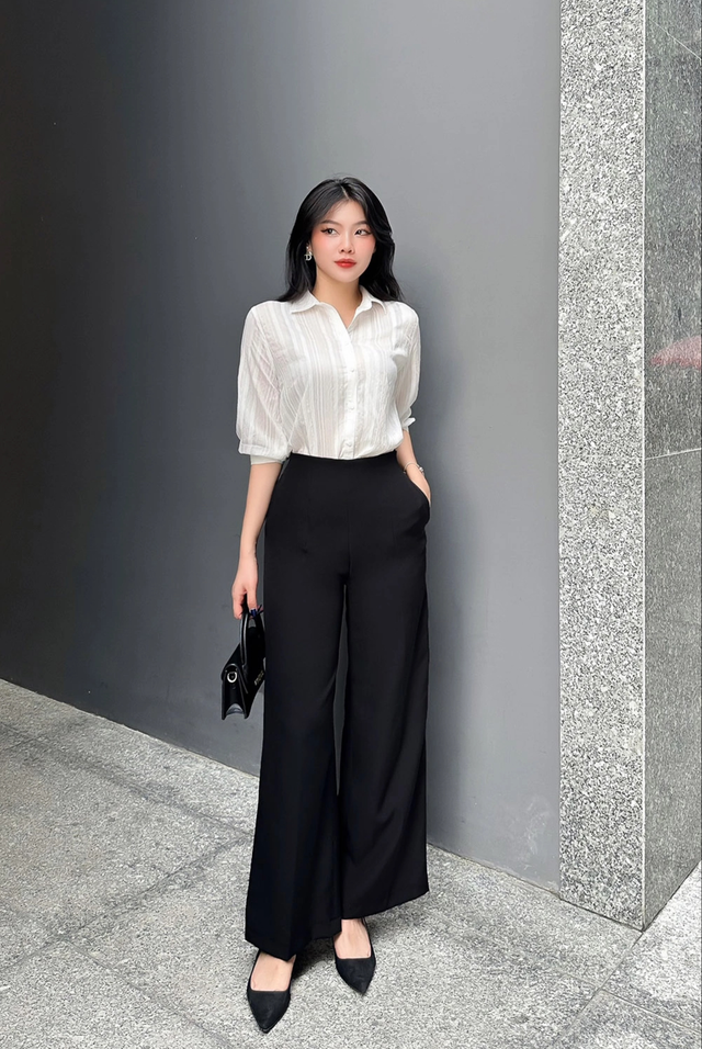 Bản phối đen trắng, tông màu 'quyền lực' định hình phong cách công sở- Ảnh 1.