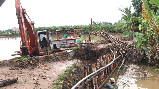 Vỡ đê ở cồn Sơn - Ảnh 1.