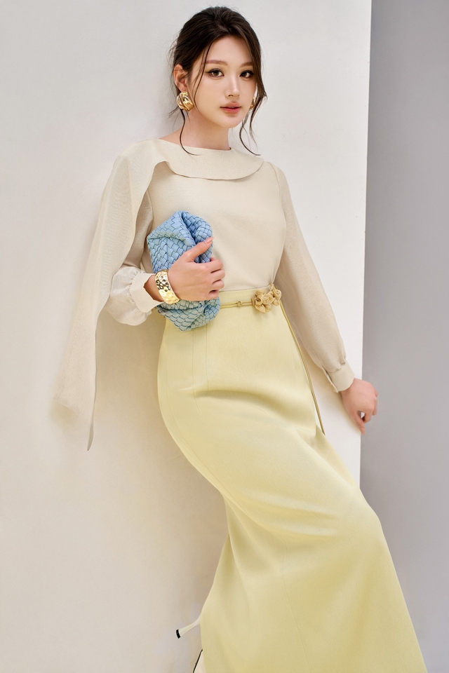 Diện mạo mới của chân váy bút chì trong tủ đồ công sở hiện đại Diện mạo mới của chân váy bút chì trong tủ đồ công sở hiện đại- Ảnh 1.