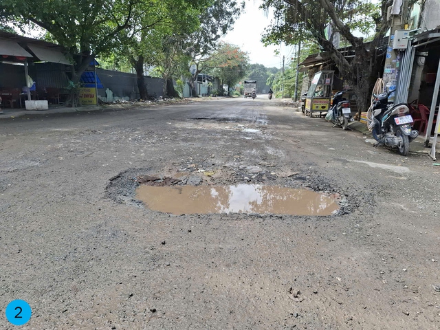 Những con đường hỏng nặng, đi lại khó khăn - Ảnh 2.