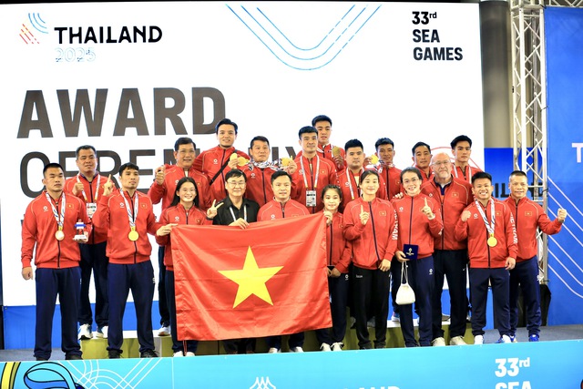 Cấn Tất Dự đi vào lịch sử SEA Games: Gia đình bày 50 mâm cỗ ăn mừng- Ảnh 2. Cấn Tất Dự đi vào lịch sử SEA Games: Gia đình bày 50 mâm cỗ ăn mừng- Ảnh 2.