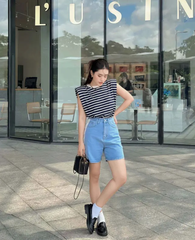 Quần jeans dáng ngắn 'thống trị' đường phố- Ảnh 7.