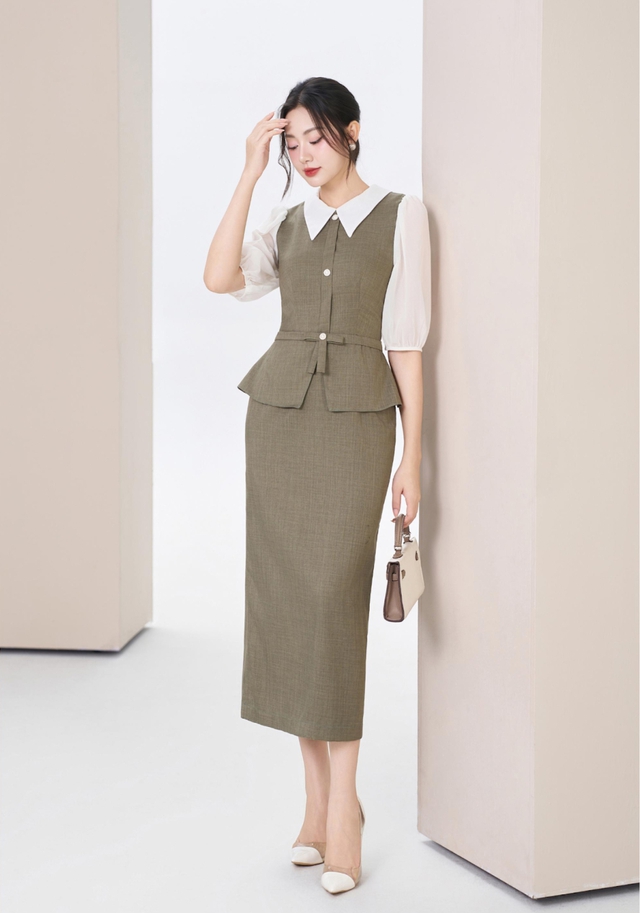 Áo peplum định nghĩa lại vẻ đoan trang trong thời trang công sở hiện đại- Ảnh 7. Áo peplum định nghĩa lại vẻ đoan trang trong thời trang công sở hiện đại- Ảnh 7.