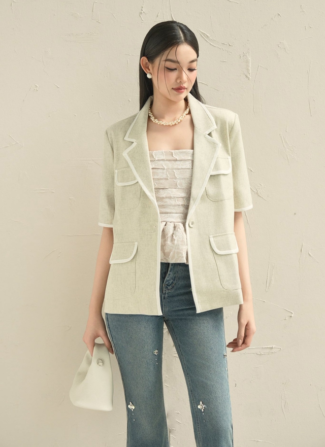 Mùa xuân 2026, mùa của những bản phối với áo khoác dáng ngắn()  - Ảnh 2.