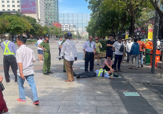 Cần nghiêm trị người dắt chó đánh trọng thương bảo vệ phố đi bộ Nguyễn Huệ- Ảnh 2.