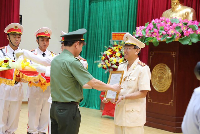 Đại tá Trần Hồng Minh giữ chức Phó giám đốc Công an TP.HCM - Ảnh 2.