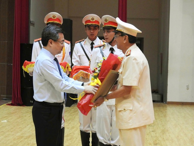 Đại tá Trần Hồng Minh giữ chức Phó giám đốc Công an TP.HCM - Ảnh 4.