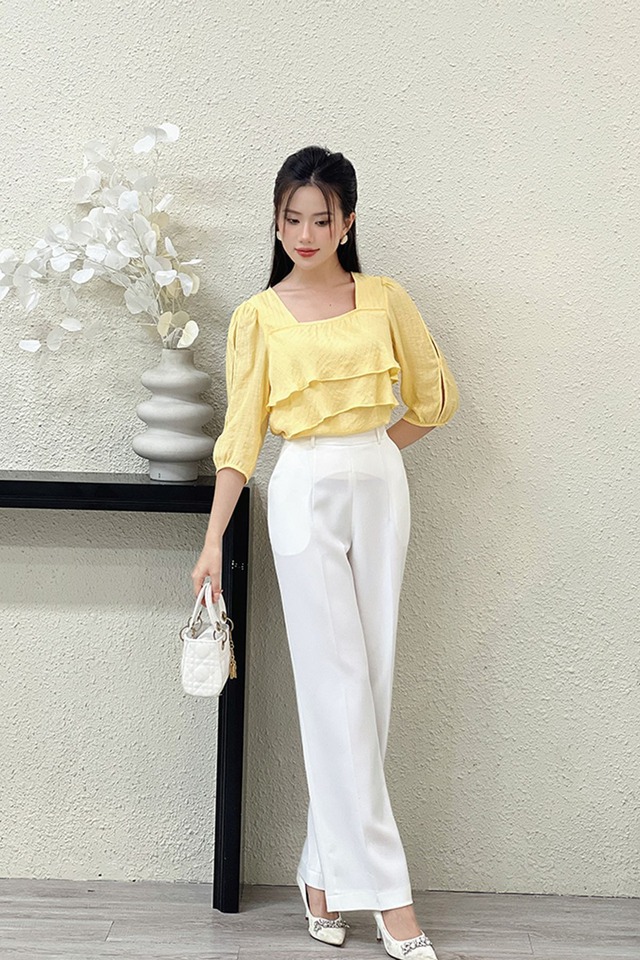 Giải mã sức hút 4 kiểu áo blouse 'đa năng' nơi công sở - Ảnh 1.