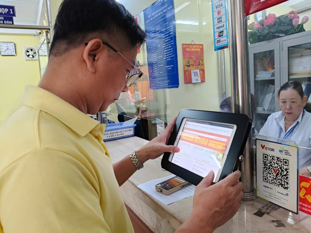 TP.HCM thử nghiệm mô hình chính quyền 2 cấp trên cổng dịch vụ công quốc gia- Ảnh 1. TP.HCM thử nghiệm mô hình chính quyền 2 cấp trên cổng dịch vụ công quốc gia- Ảnh 1.