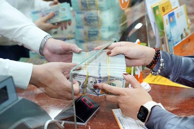 Gi&aacute; USD h&ocirc;m nay 28.3.2025: Đ&ocirc; tự do tăng- Ảnh 1.