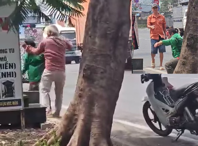 Xử lý 2 tài xế xe ôm đánh nhau loạn xạ trên đường ở Hóc Môn- Ảnh 1.