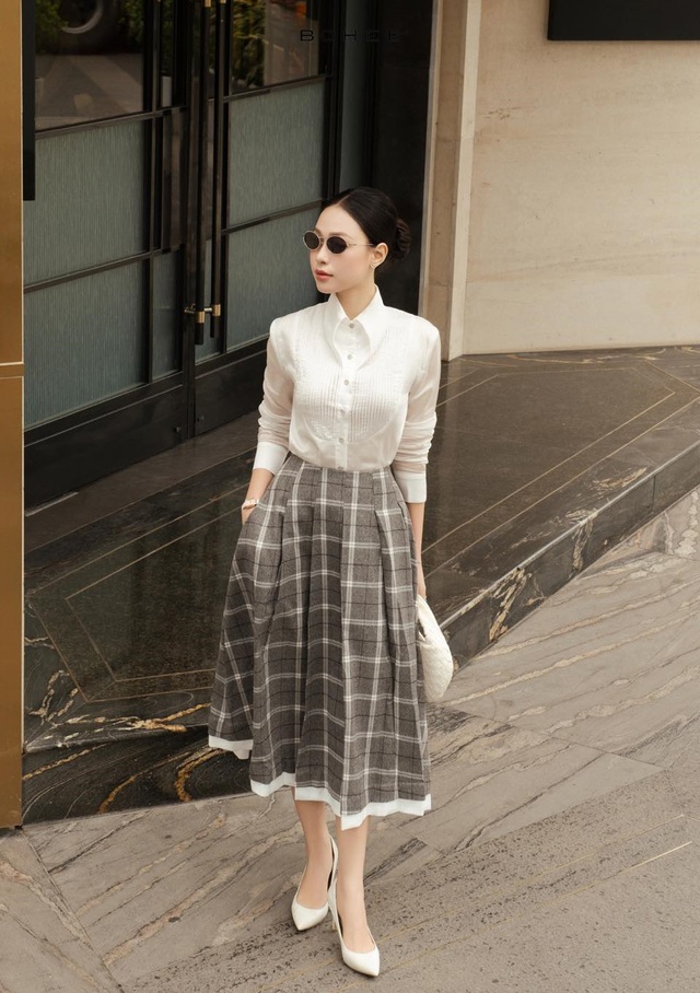 Dịu dàng mà cuốn hút, vẻ đẹp bất biến từ những chiếc váy midi - Ảnh 7.