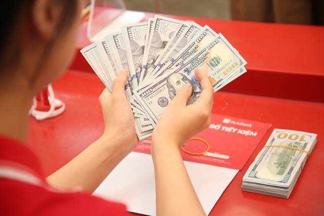 Giá USD hôm nay 22.4.2025: - Ảnh 1.
