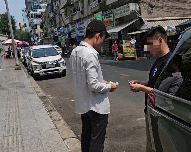 Dẹp nạn thu phí đỗ xe lụi kéo dài gây bức xúc tại TP . HCM - Ảnh 1. Dẹp nạn thu phí đỗ xe lụi kéo dài gây bức xúc tại TP . HCM - Ảnh 1.