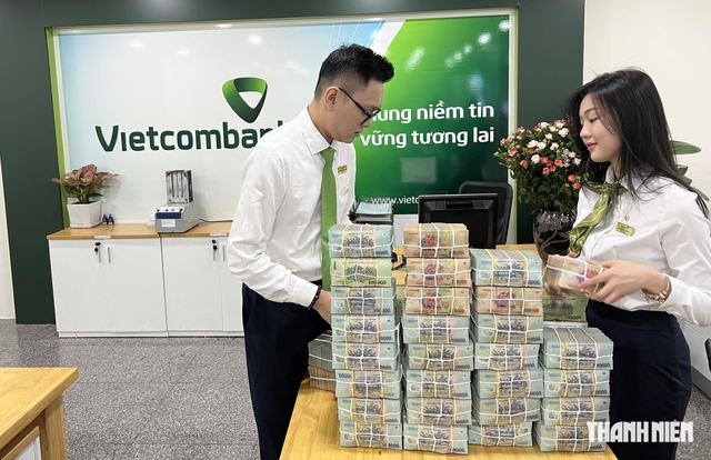 C&aacute;c ng&acirc;n h&agrave;ng Vietcombank, Sacombank giảm l&atilde;i suất cho vay- Ảnh 1.
